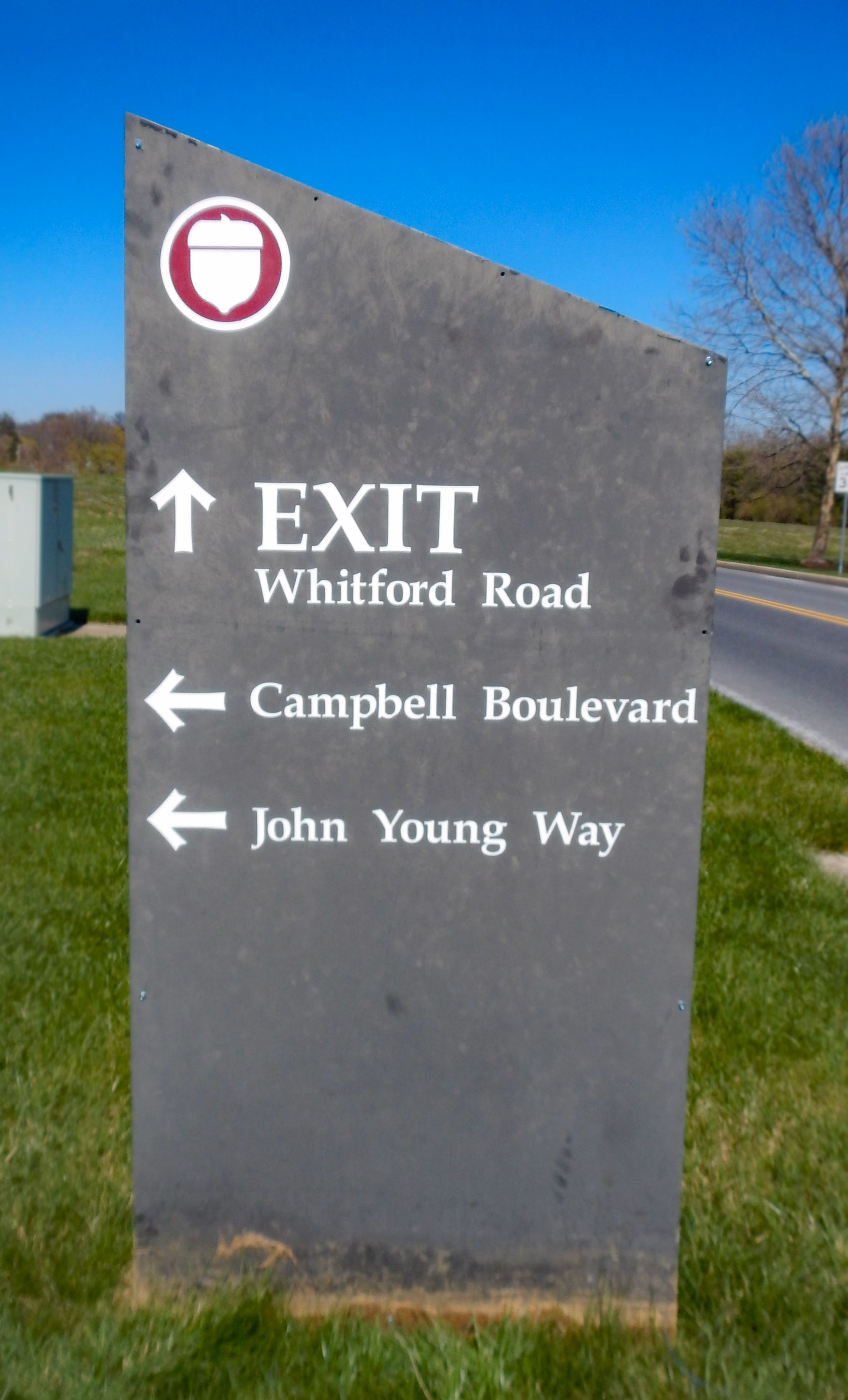 Exterior direction sign on a large corporate center campus