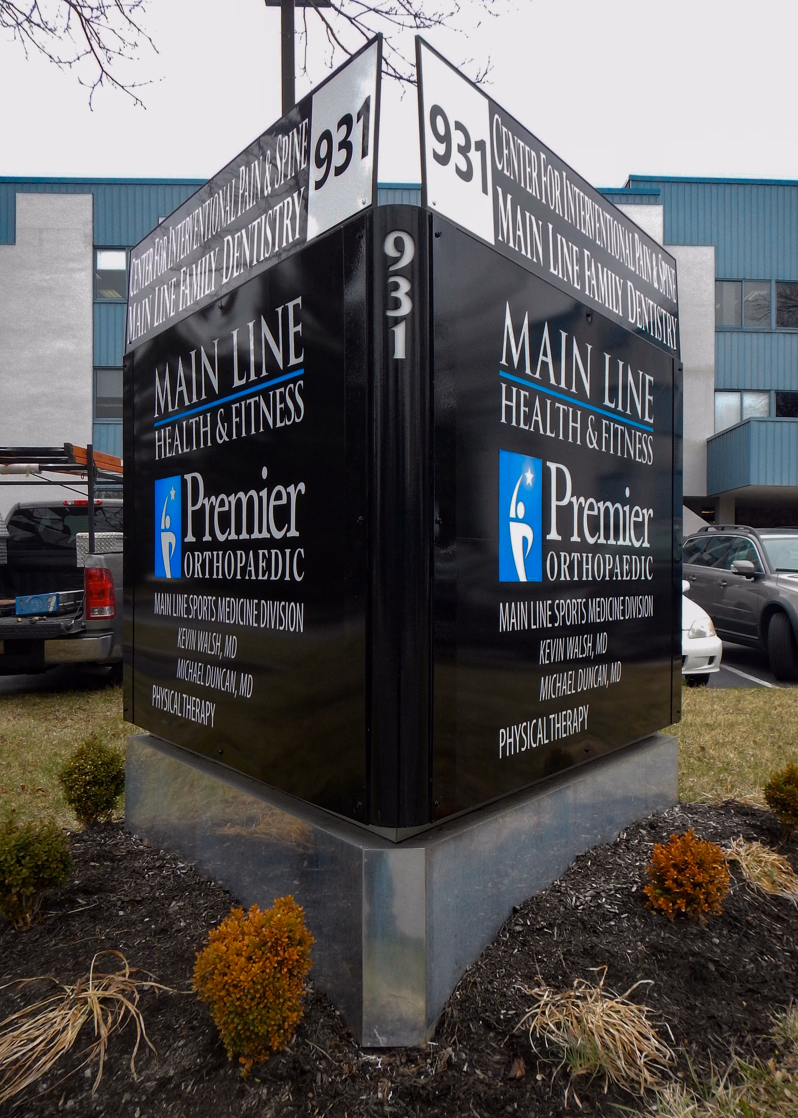 Large monument sign with aluminum faces and vinyl graphics