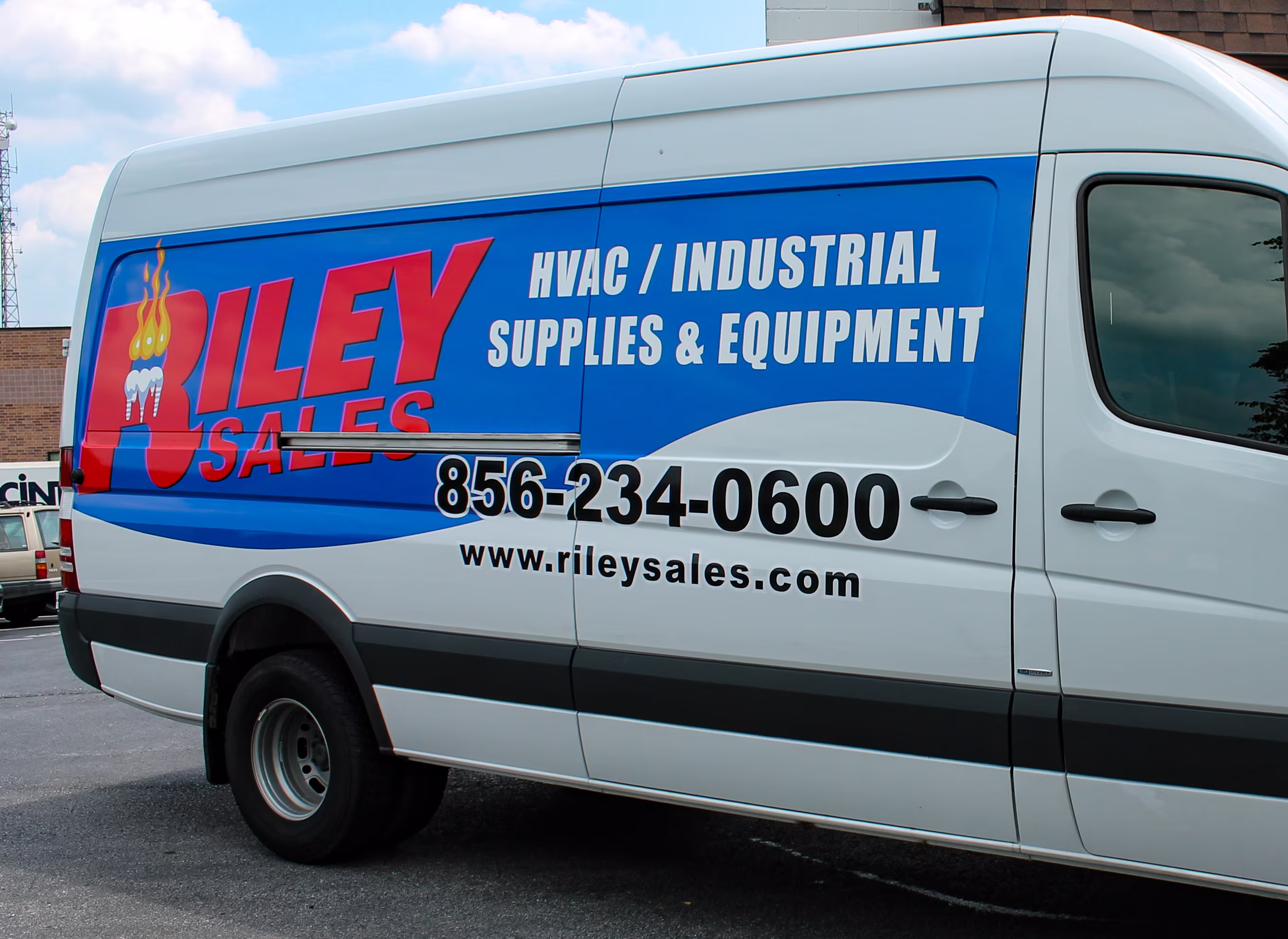 Custom HVAC company vinyl wrap on a transit van