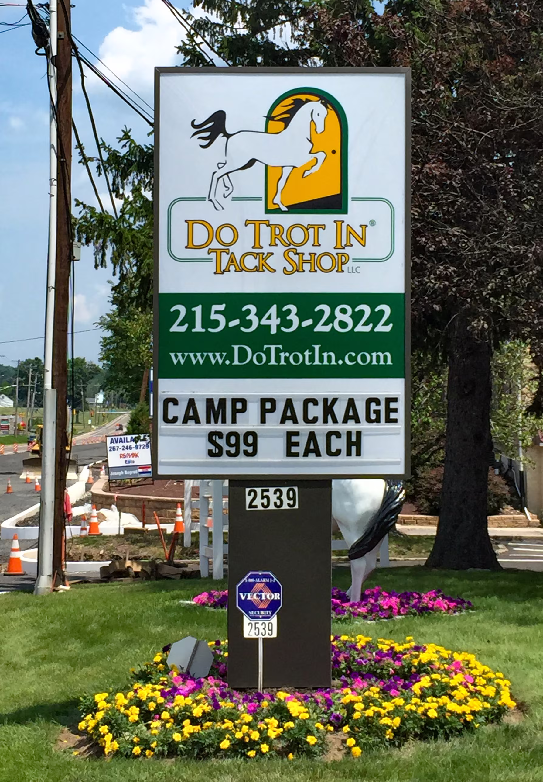 Tall monument sign with interior lighting and letter rails