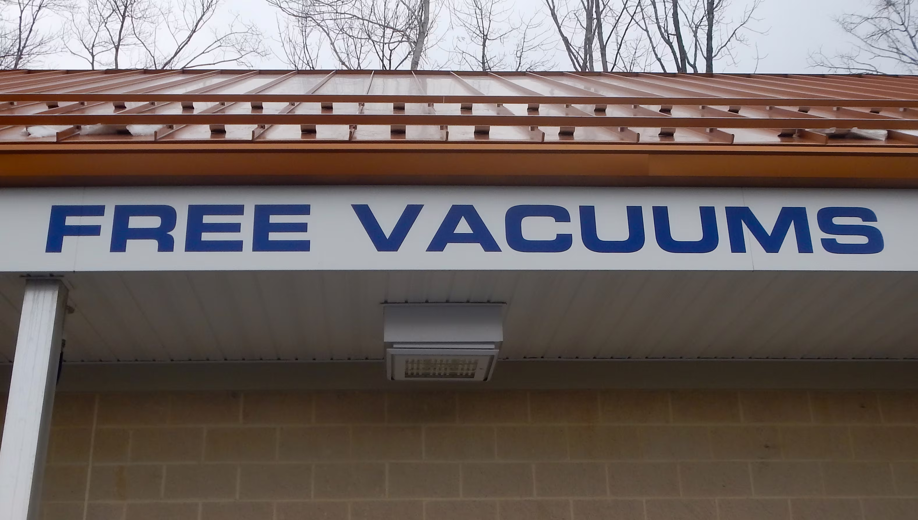 Vinyl lettering on the exterior facade of a building