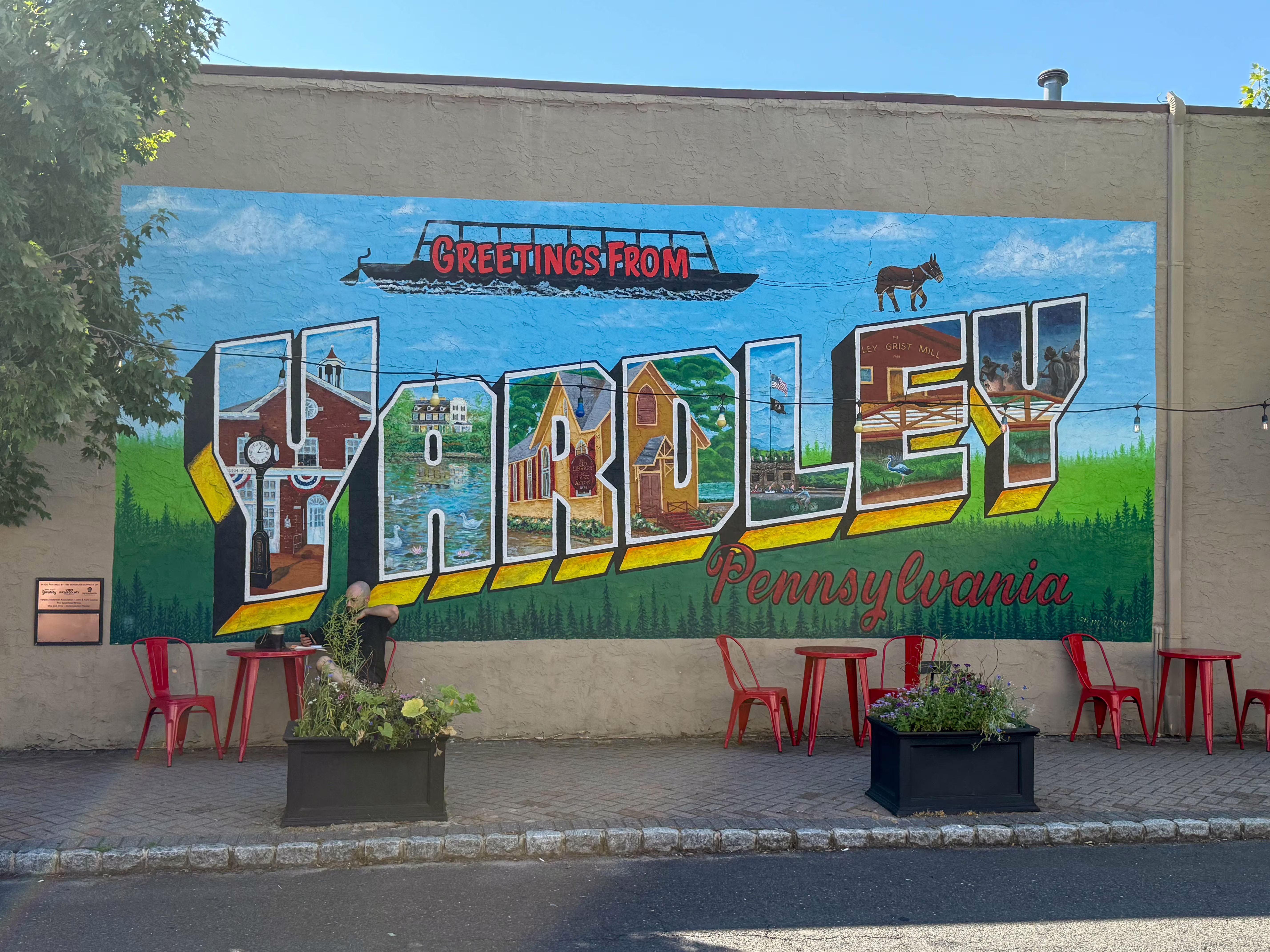 "Greetings from Yardley" mural at 15 South Main Street in Yardley, PA serving the local community