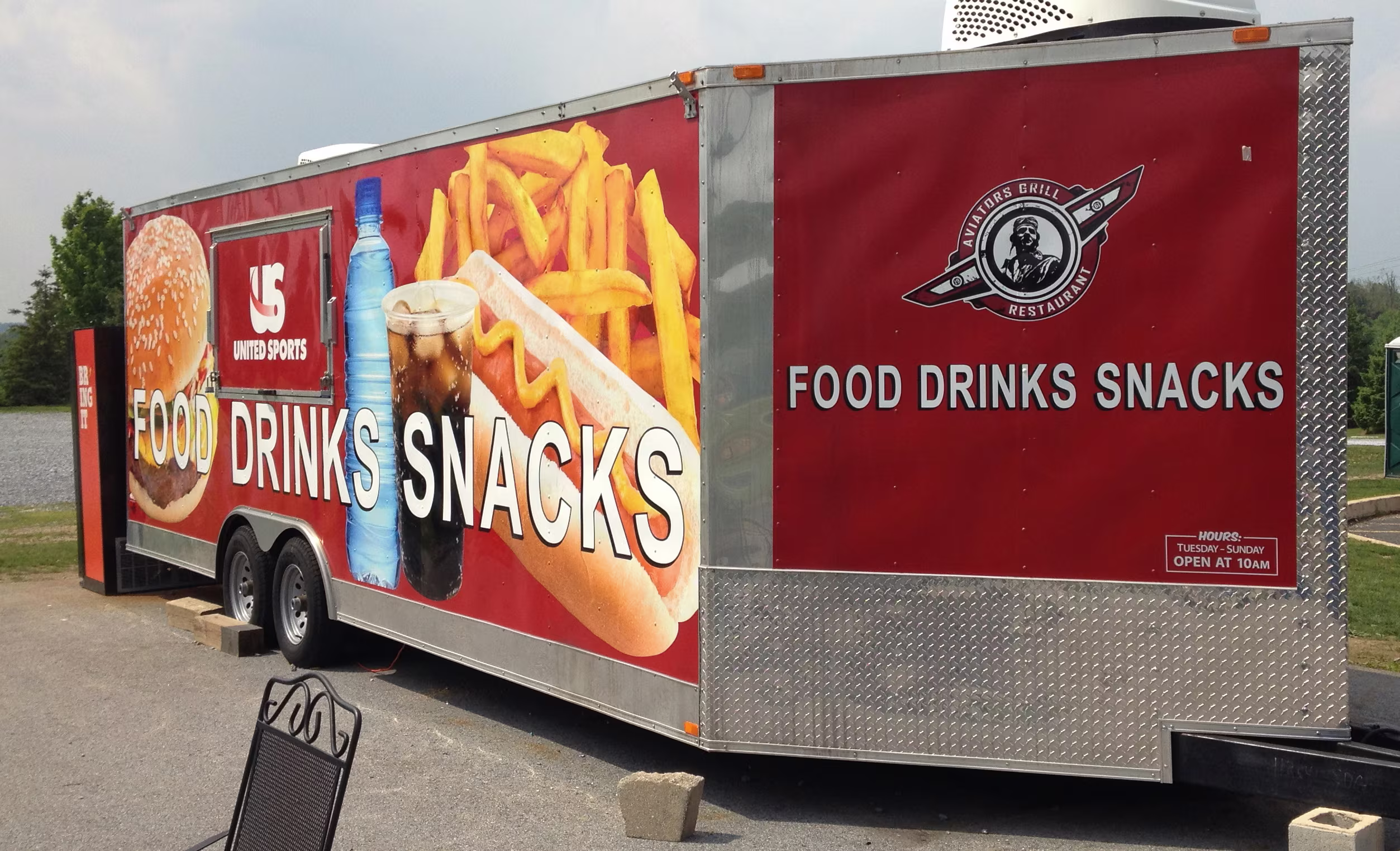 Custom-wrapped long box trailer