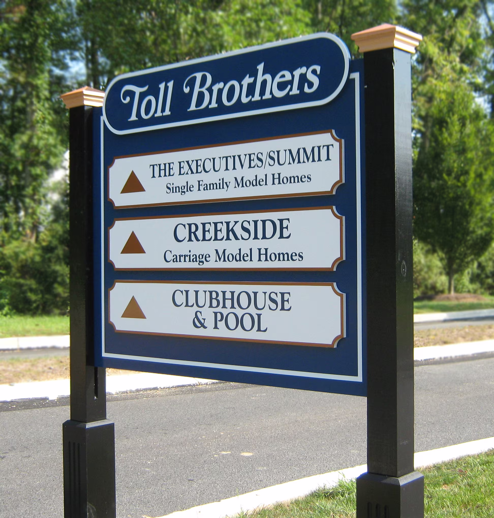 Custom acrylic panels mounted between two black posts