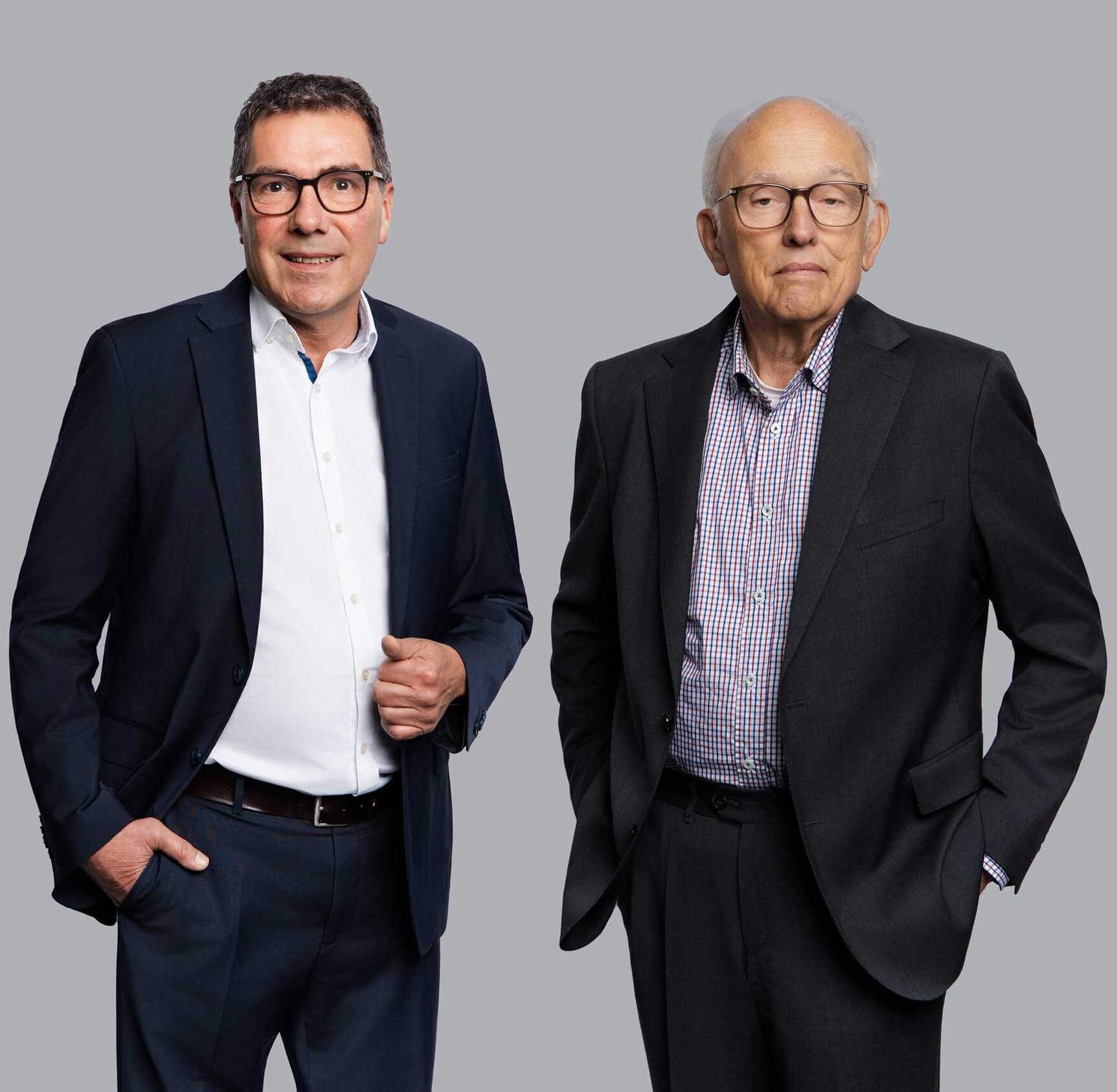 Portraitbild der Fachanwälte Andernach und Niehaus mit einem Lächeln