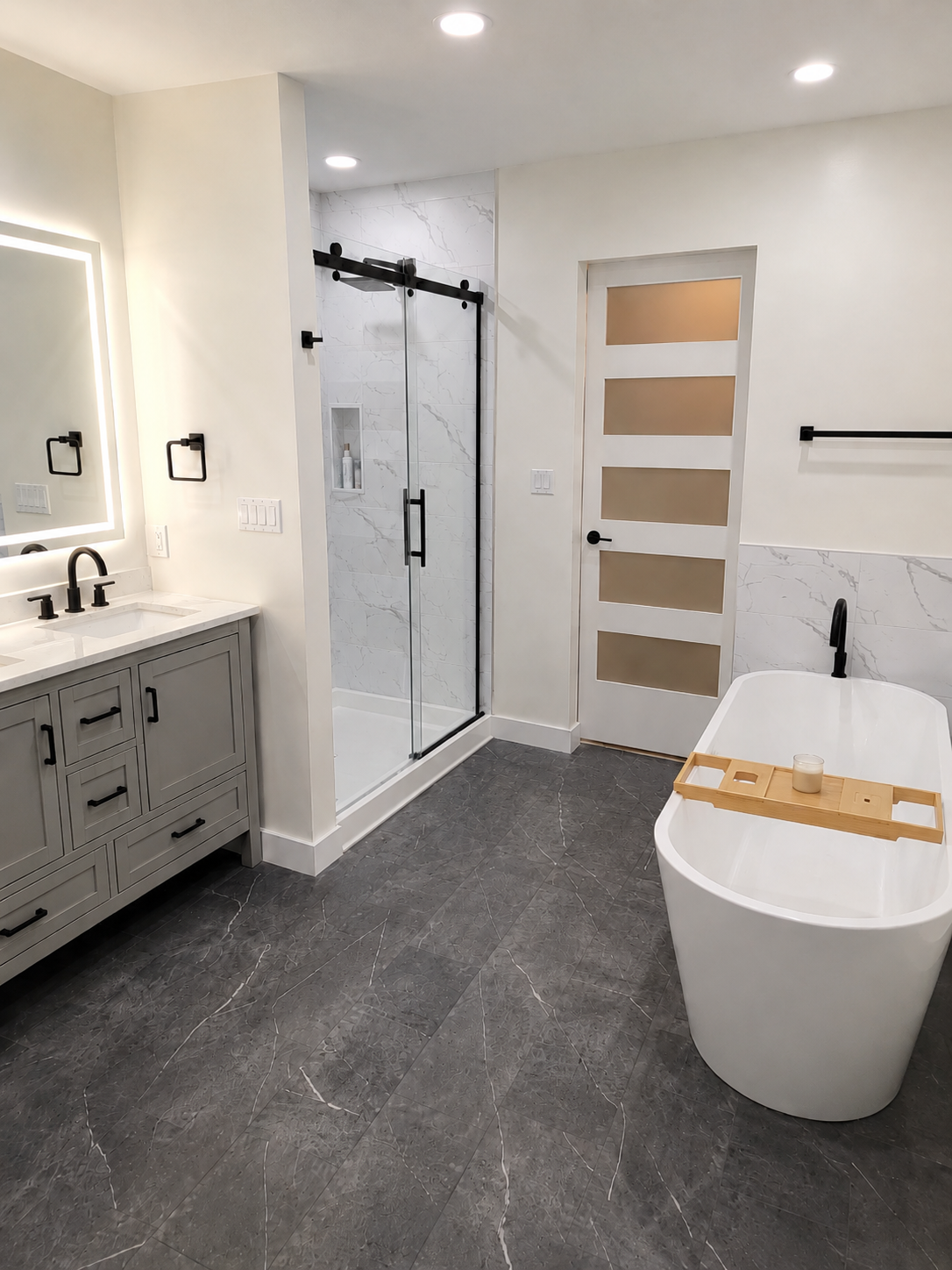 Finished bathroom vanity remodel by JCZ Residential in Central Indiana