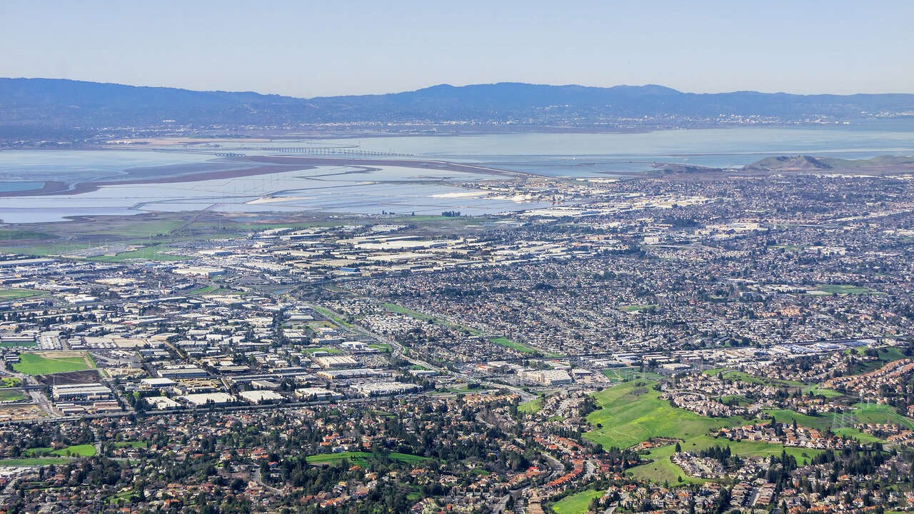 image of a teacher interacting with students using digital tools