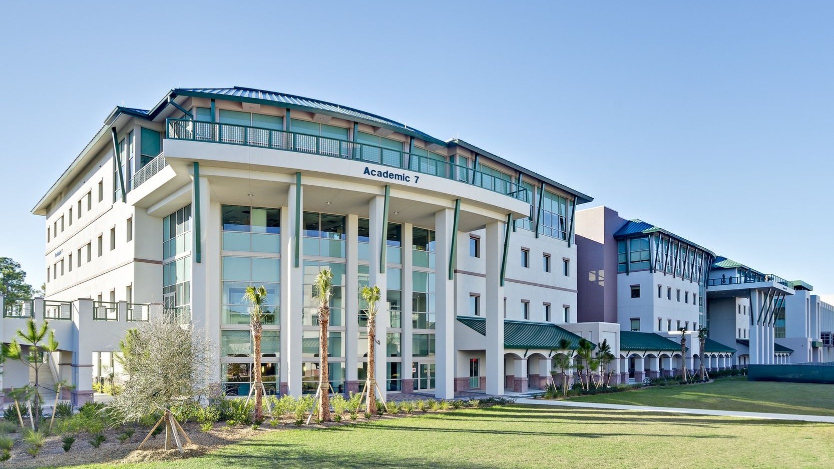 image of a teacher interacting with students using digital tools