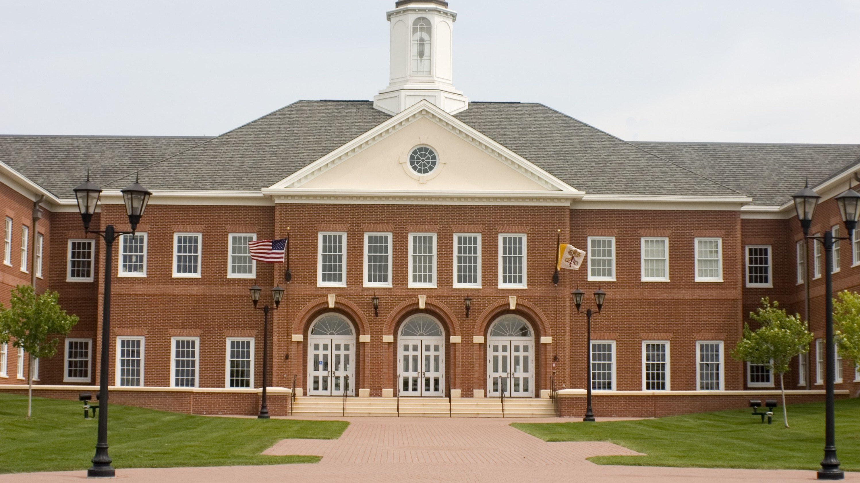 image of a teacher interacting with students using digital tools