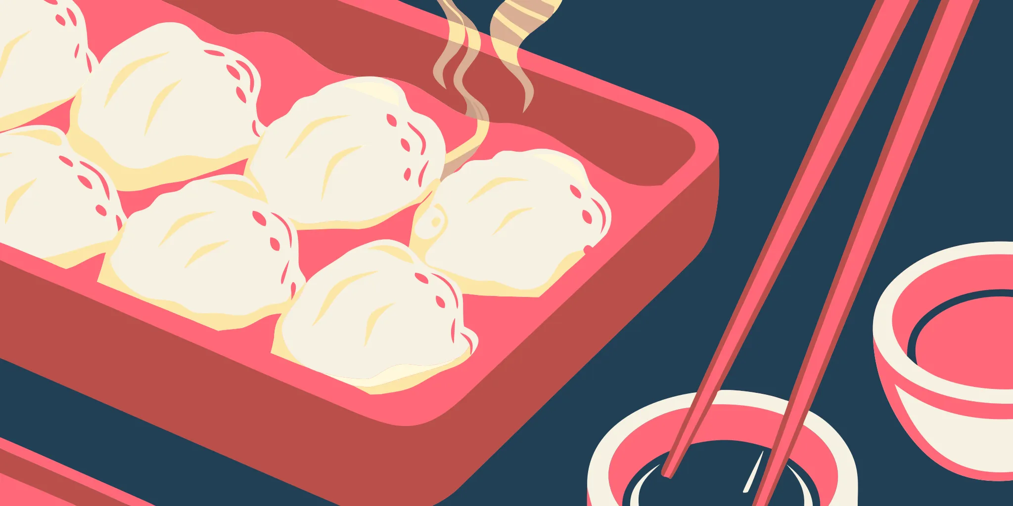 Pan-fried Japanese gyoza dumplings on a plate with dipping sauce.