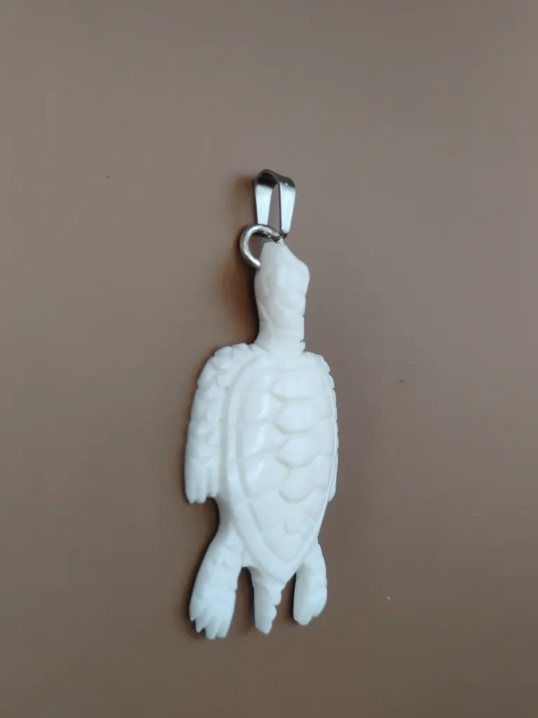 Pendentif os tortue vue gauche