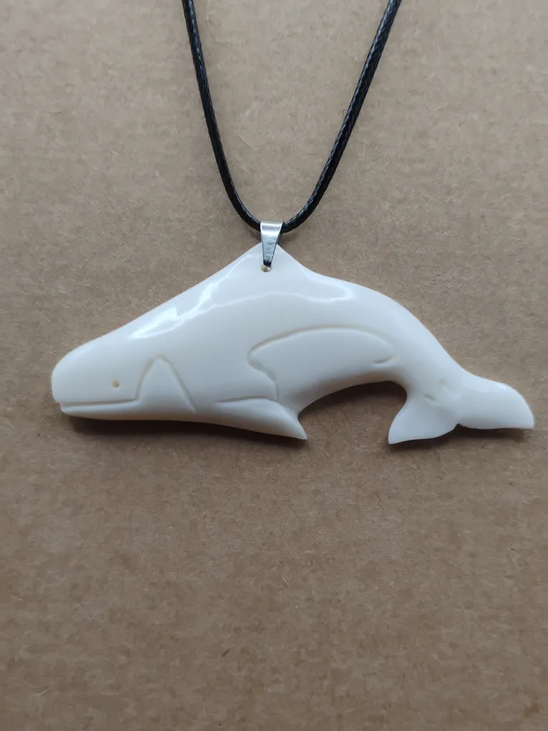 Pendentif os orque vue porté