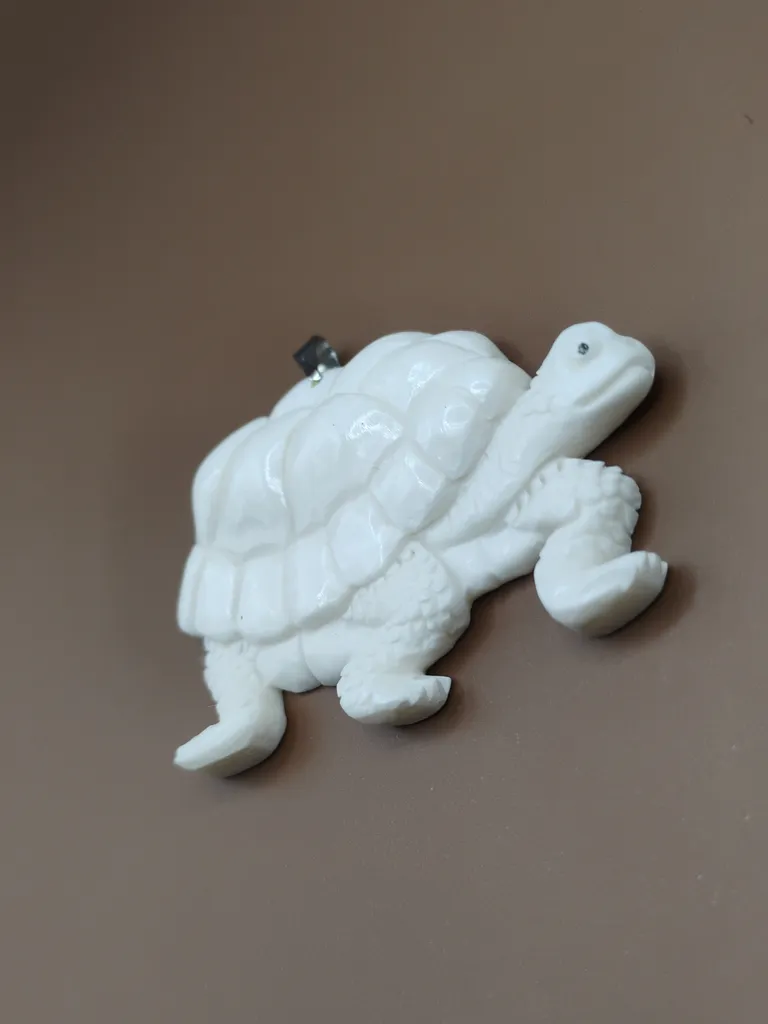 Pendentif os luxe tortue vue droite