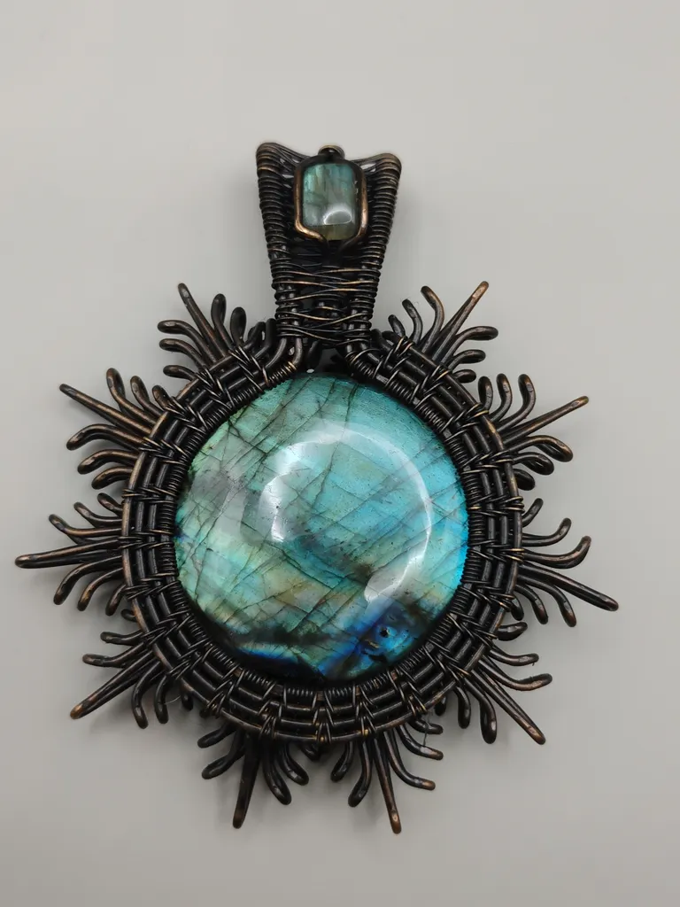 Pendentif Aztèque -Offrande au Dieu-Soleil-