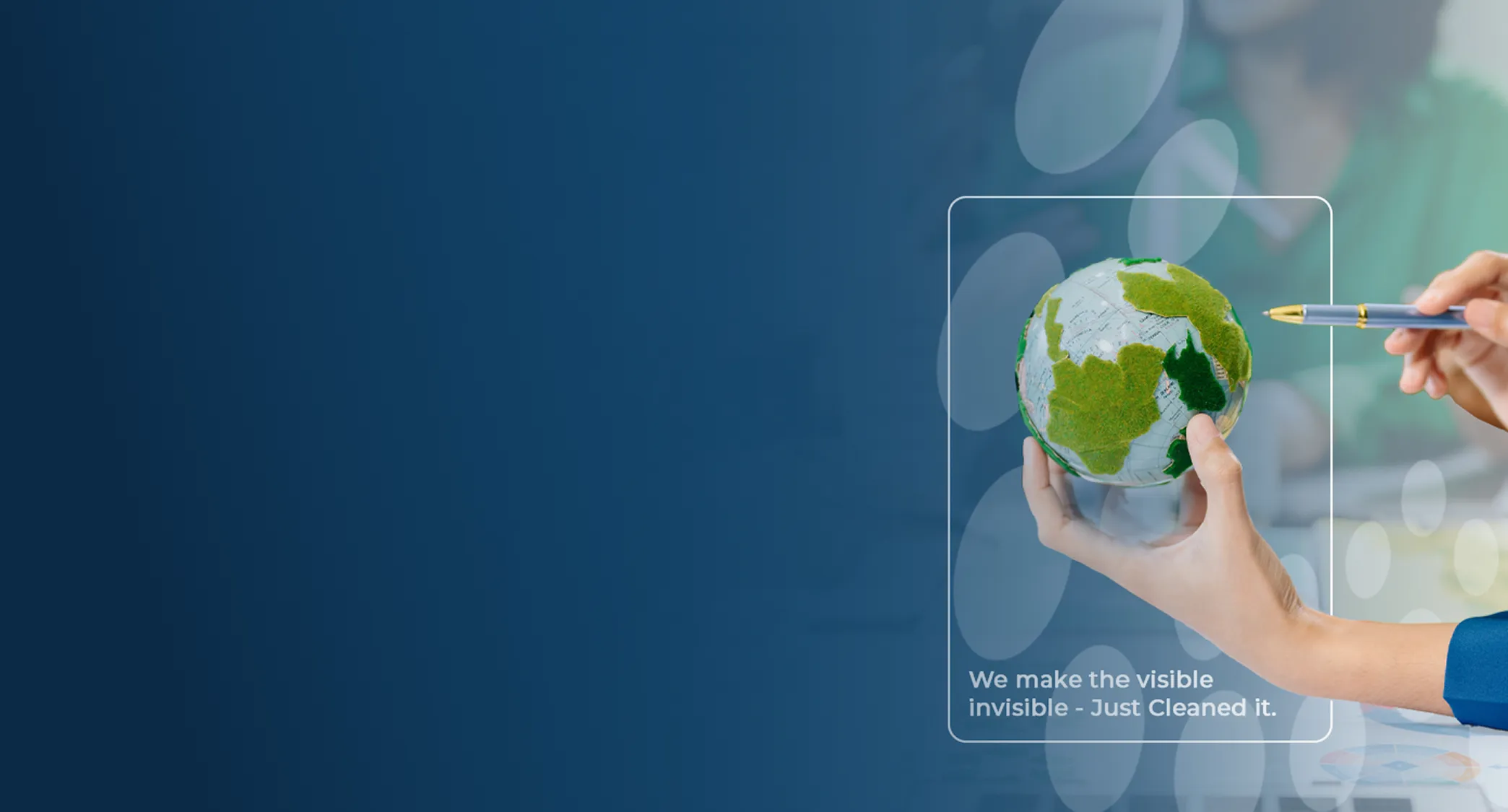 Hand holding a globe with green moss-covered continents, another hand pointing at it with a pen, and text saying 'We make the visible invisible - Just Cleaned it.'