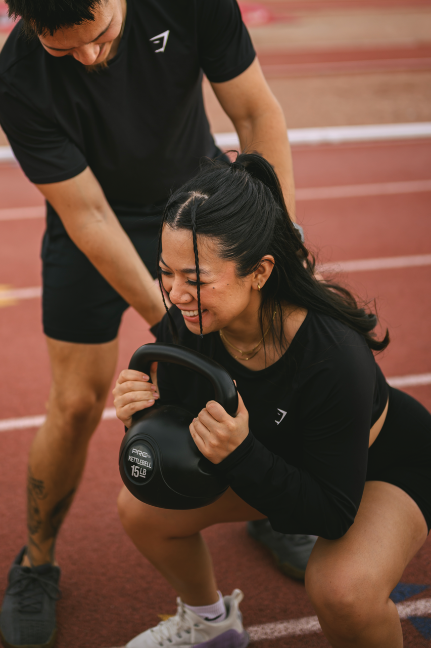 image of volunteer teaching children