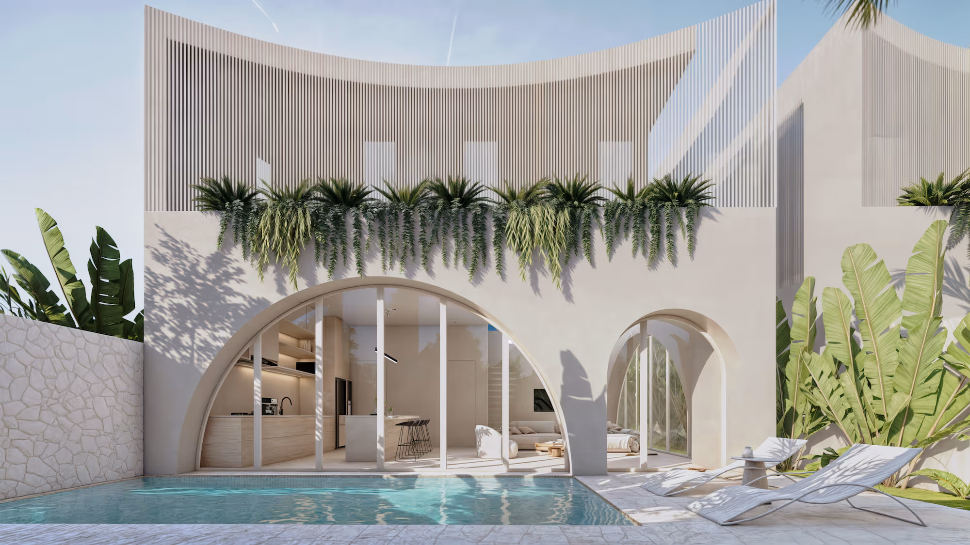 Modern white house with large arched windows, a swimming pool, lounge chairs, and tropical plants on a sunny day.