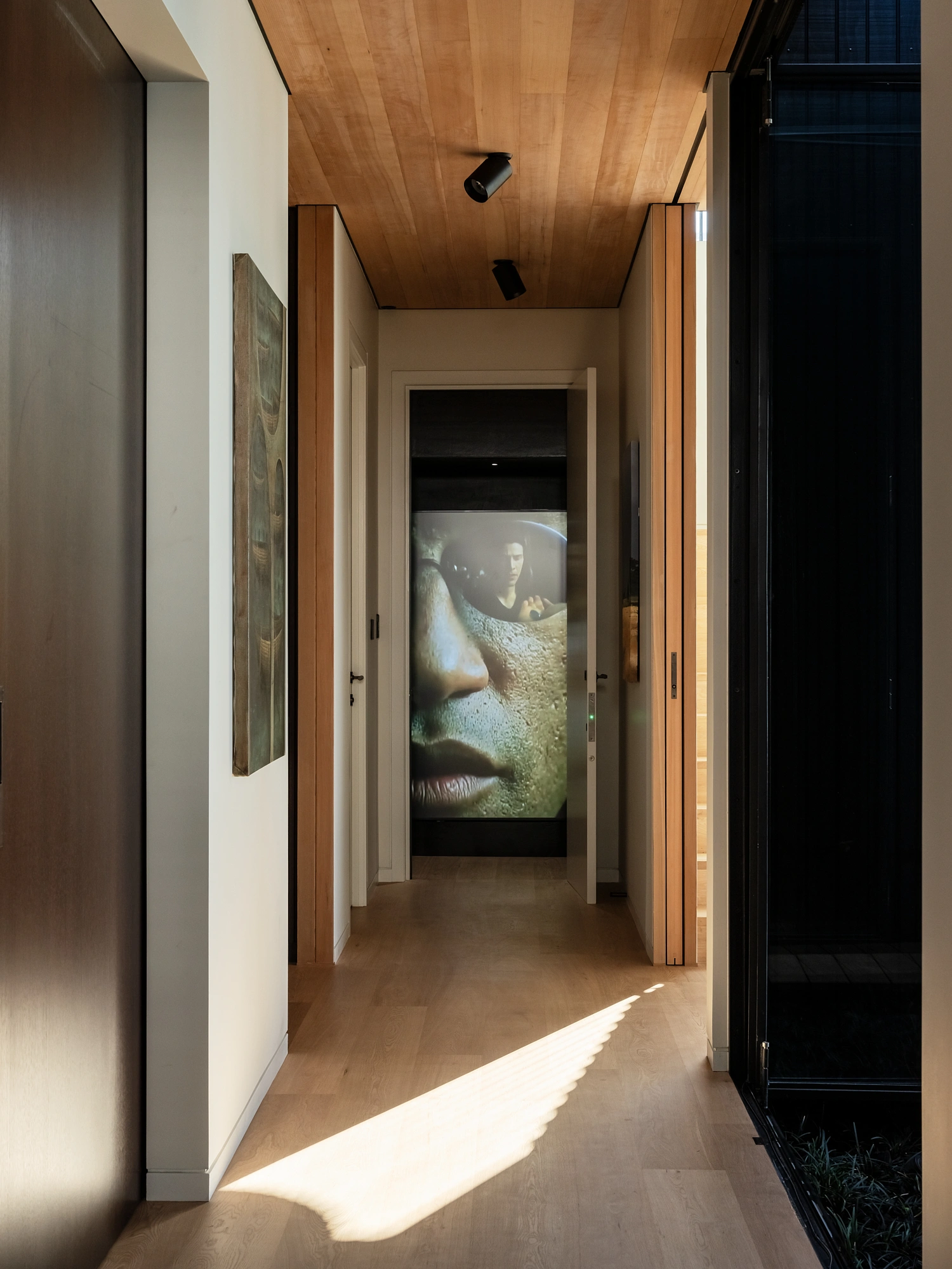 Modern interior living space with custom architectural joinery and timber ceilings by Graham Mauger Builders
