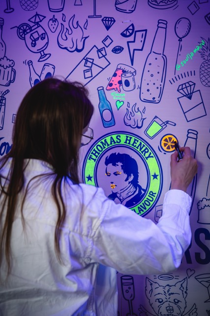 image of patrons interacting at a modern bar counter