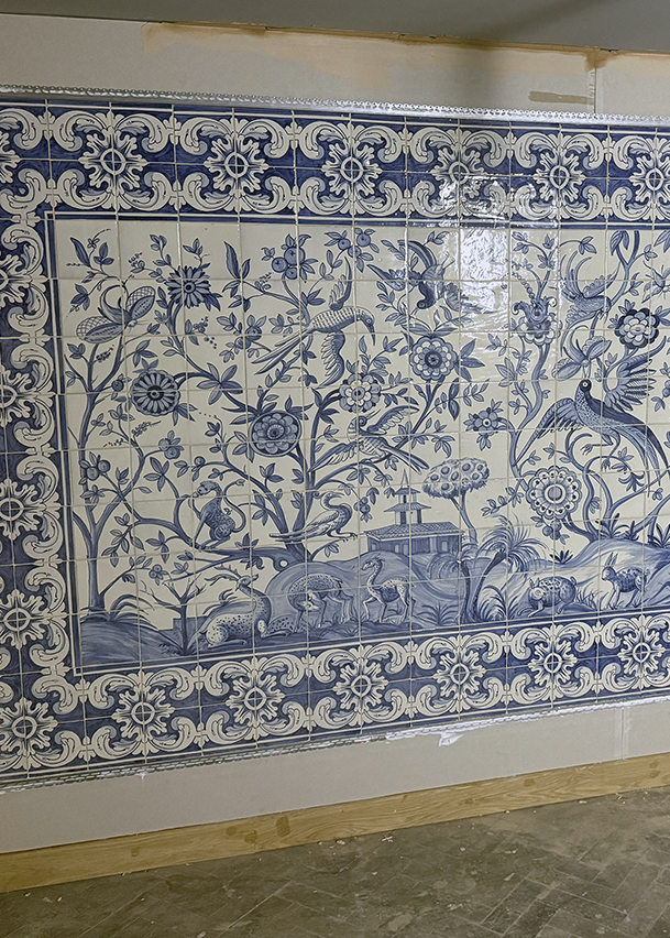 Hand-painted azulejo recreation of a 17th-century altar frontal in the downstairs dining room at Bar Douro Soho