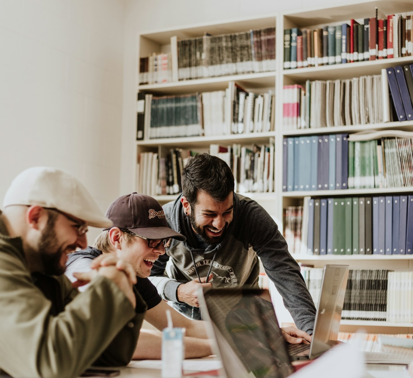 a team of people collaborating work environment newton33