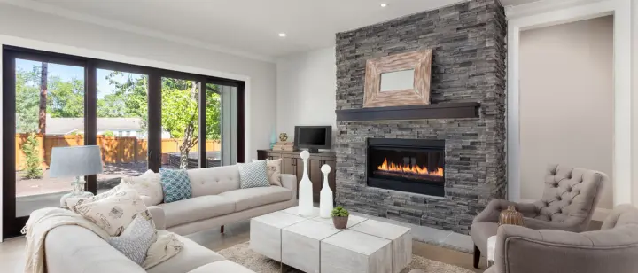 a lounge with a fireplace