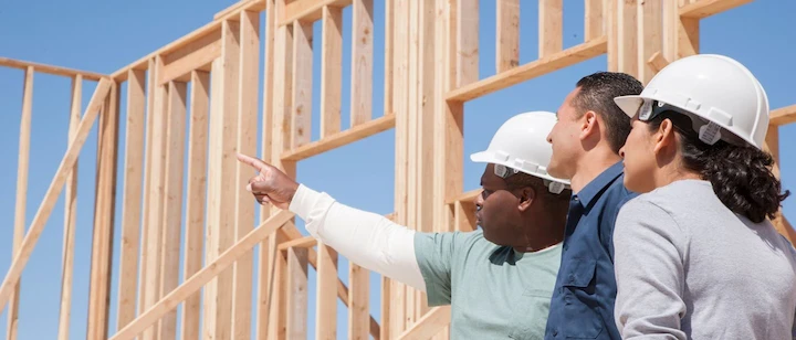 an image of builders constructing a Wendy house