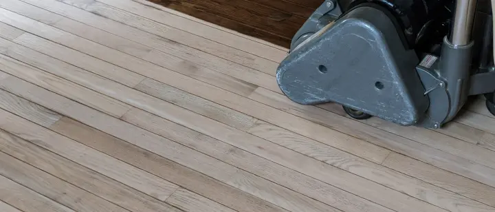 wooden floor with sanding maching