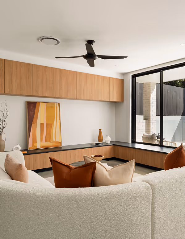 Sunken lounge room with decorative cushions