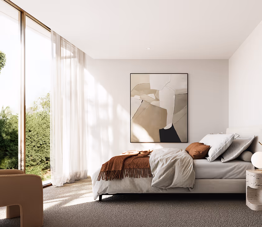 luxurious bedroom with large windows giving an expansive view of the backyard.