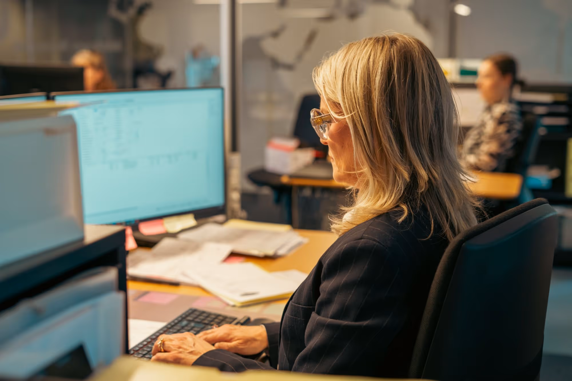 woman looking at a computer