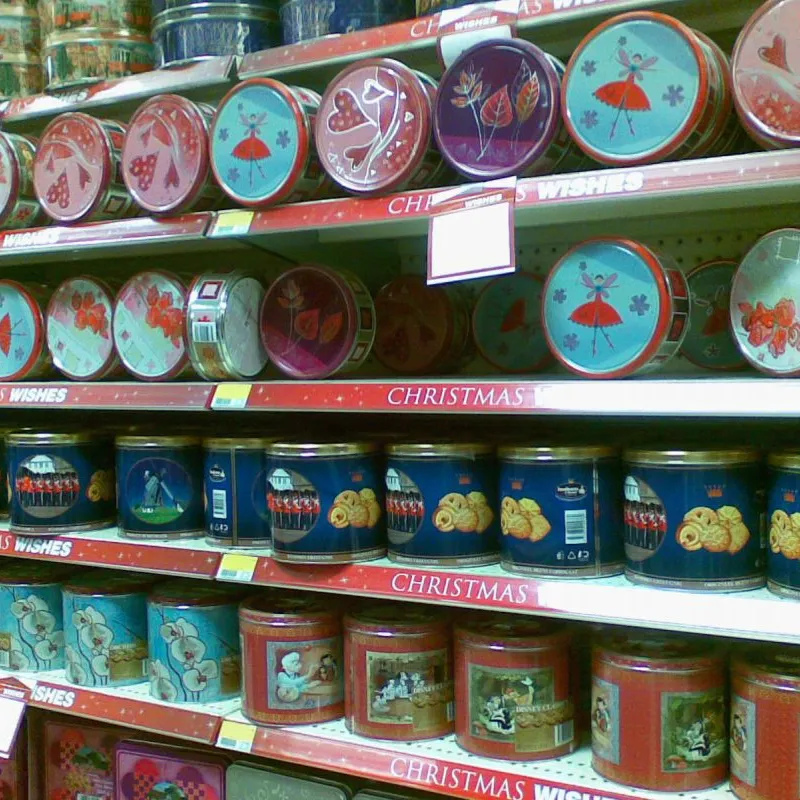 Shelves stocked with Jacobsens Danish butter cookie tins in a supermarket in Australia