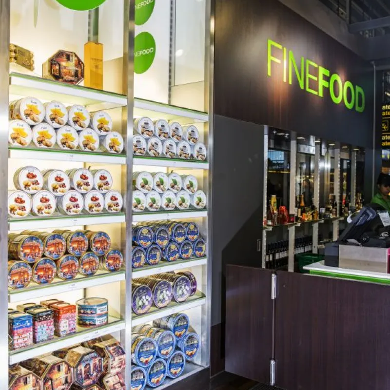 Jacobsens cookie tins on shelves at a fine food shop in Denmark
