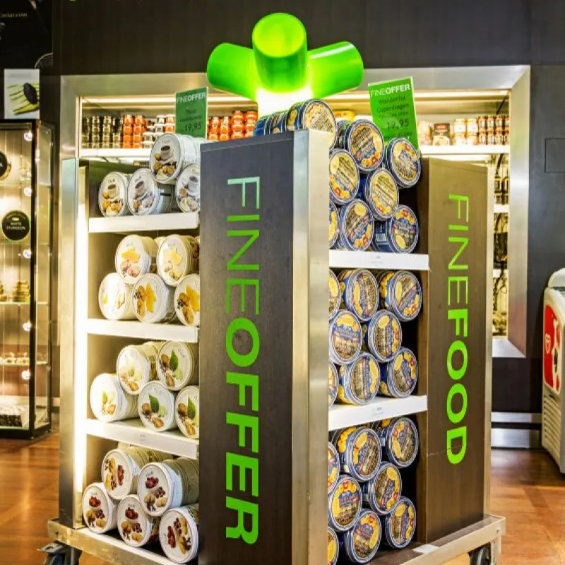 Gift-wrapped fine food display tower with Jacobsens cookie tins in Denmark