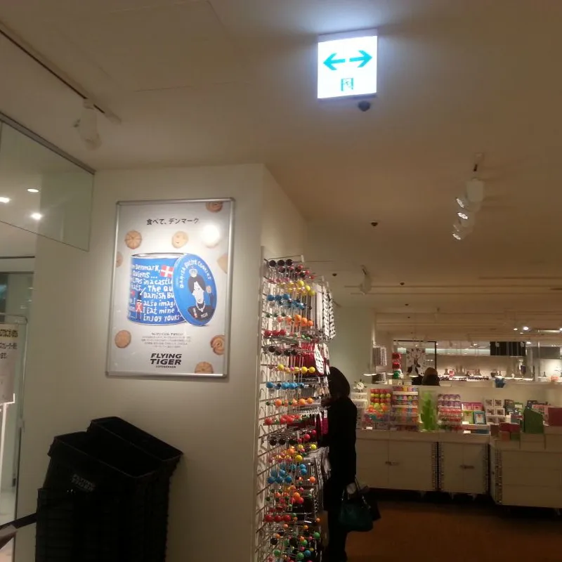 Jacobsens cookie poster and products in a department store aisle in Japan