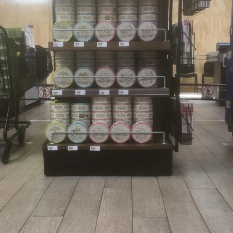Freestanding shelf unit with Danish cookie tins in a store in Mexico