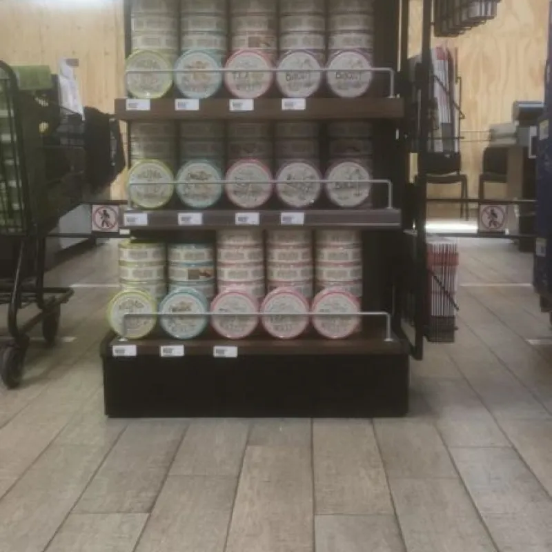 Freestanding shelf unit with Danish cookie tins in a store in Mexico