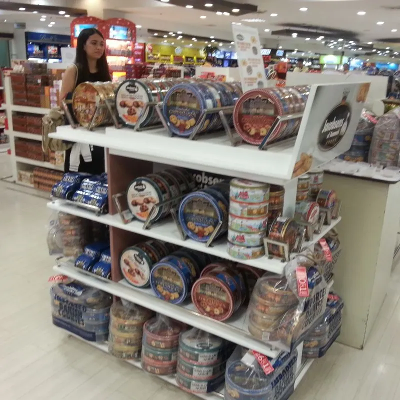 Island display of Danish butter cookie tins in a supermarket in the Philippines