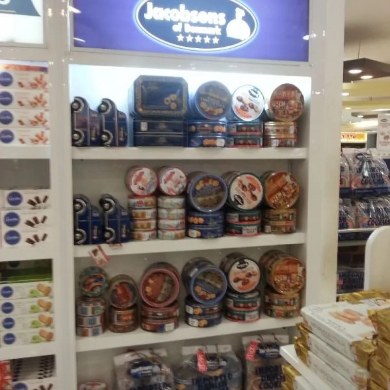 Jacobsens of Denmark branded shelf with cookie tins in the Philippines