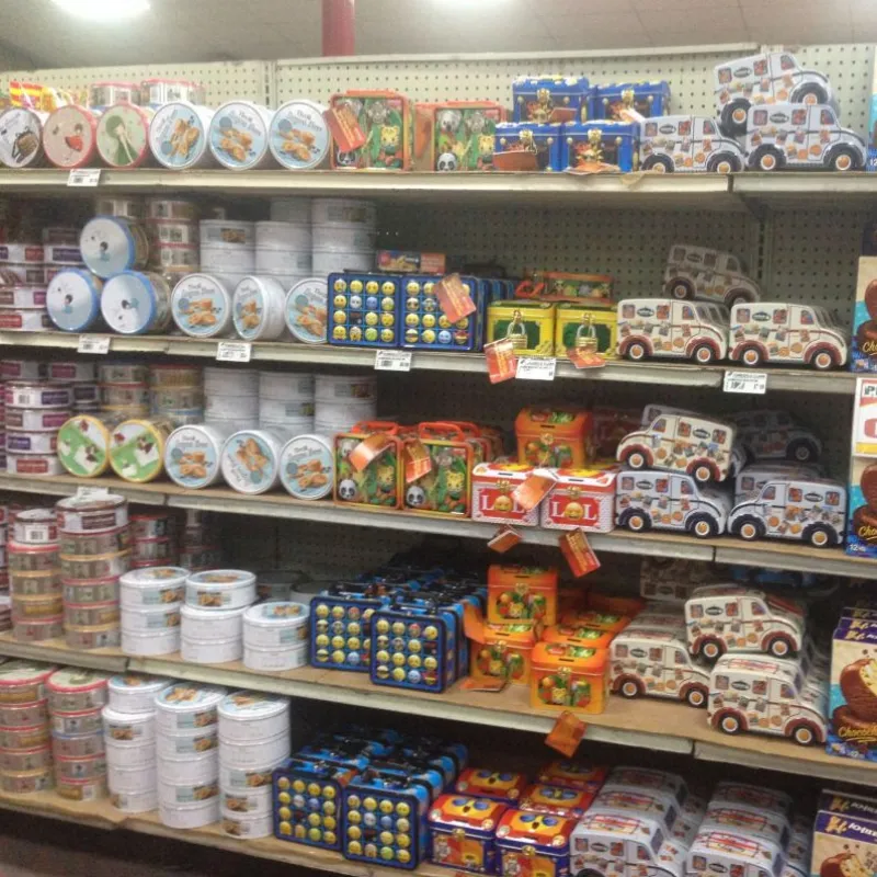 Supermarket shelves with cookie tins and novelty gift tins in the Philippines