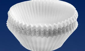 Stack of white paper baking cups