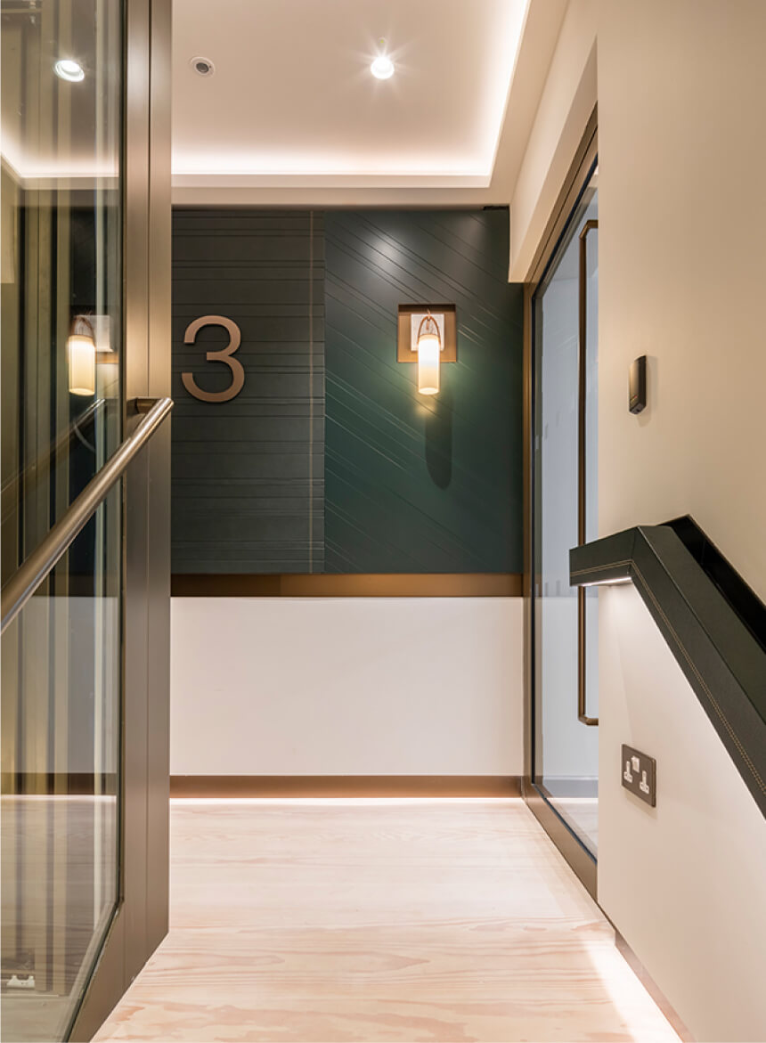property interior showing a sophisticated hallway with panelling