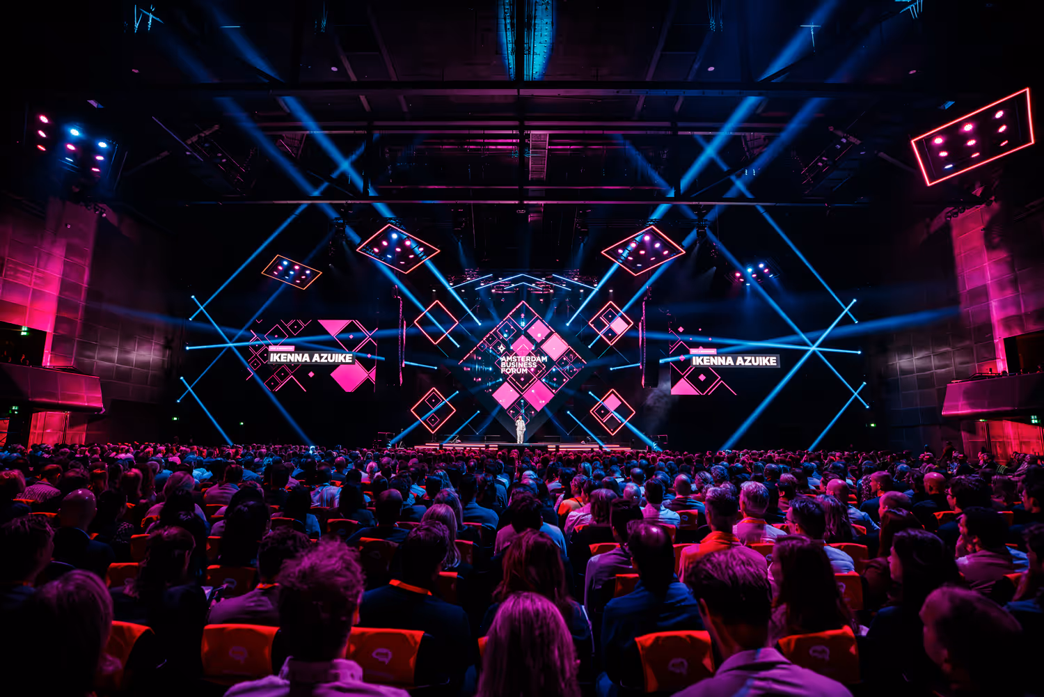 a woman on stage presenting