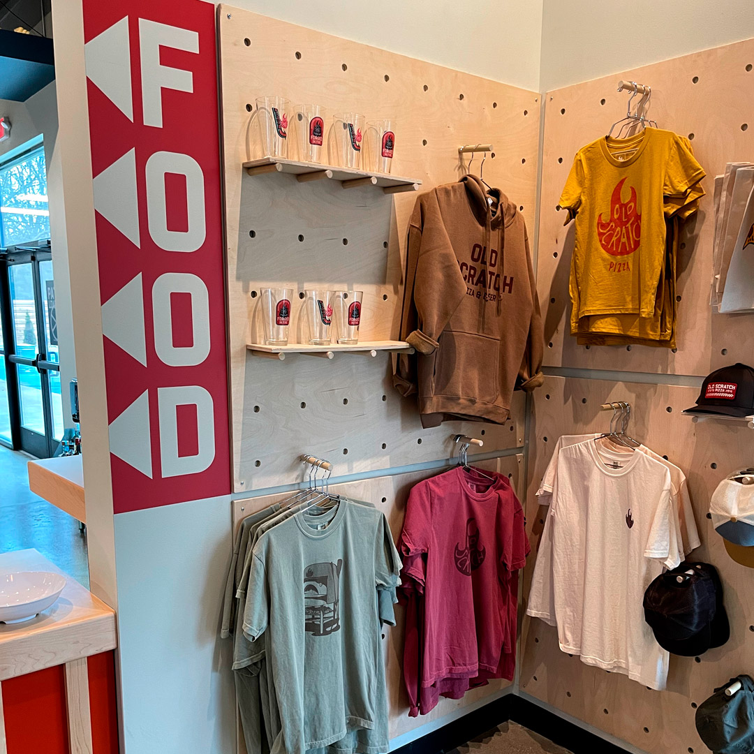 Old Scratch Pizza merch wall