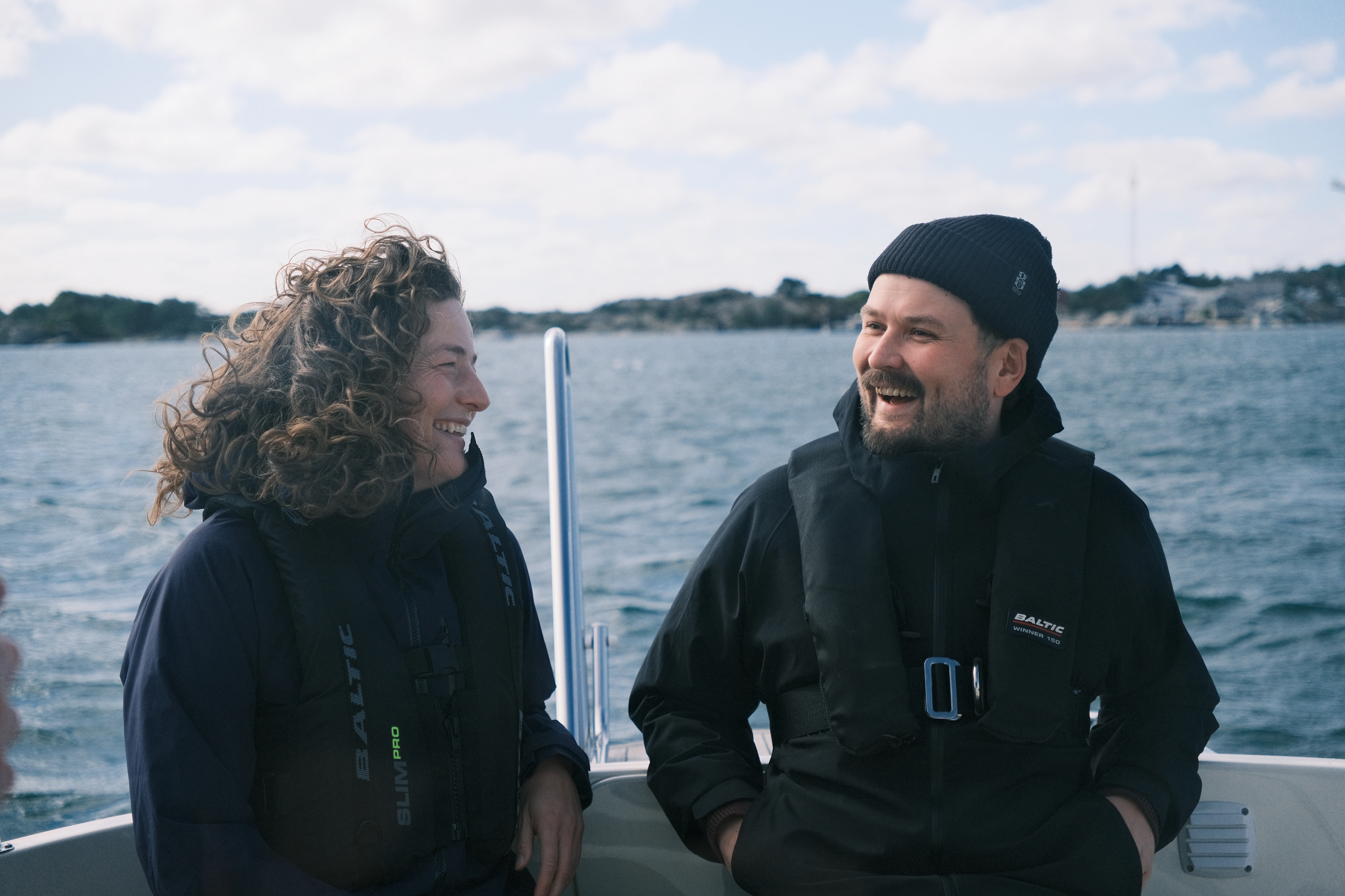 Smiling people on a boat