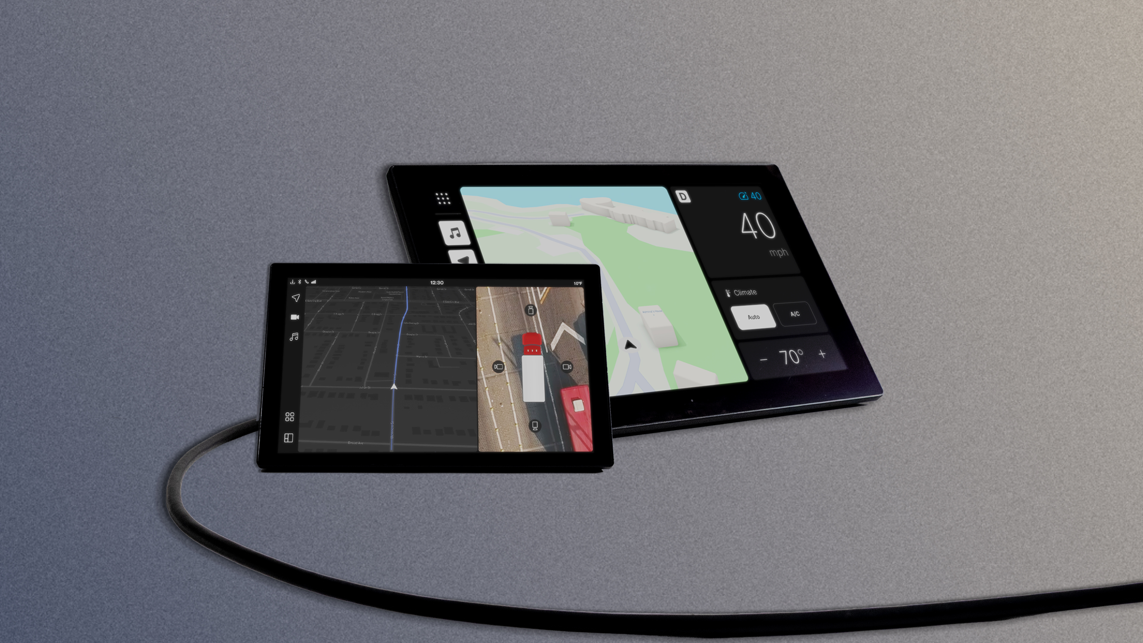 Two car dashboard touchscreen displays showing navigation and rear camera views, speed of 40 mph, and climate control set to 70°F.