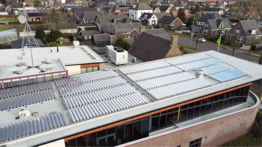 A roof of a building with a few buildingsAI-generated content may be incorrect.