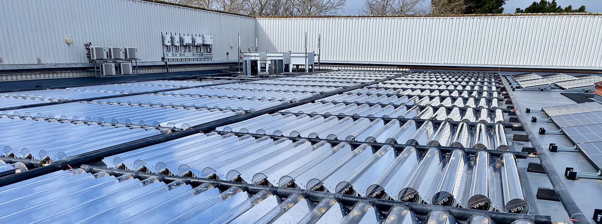 Virtu solar array on commercial building roof