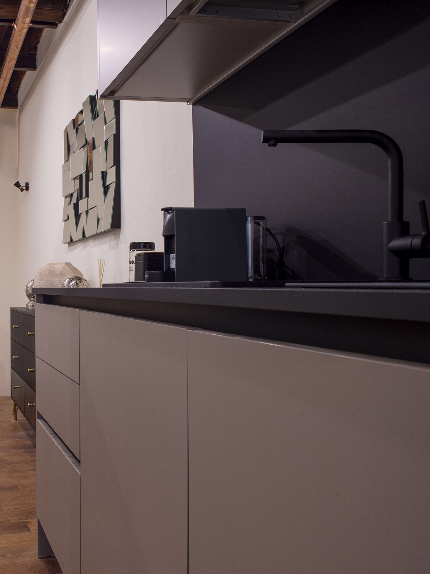 Sunlit living room with neutral tones and large glass doors