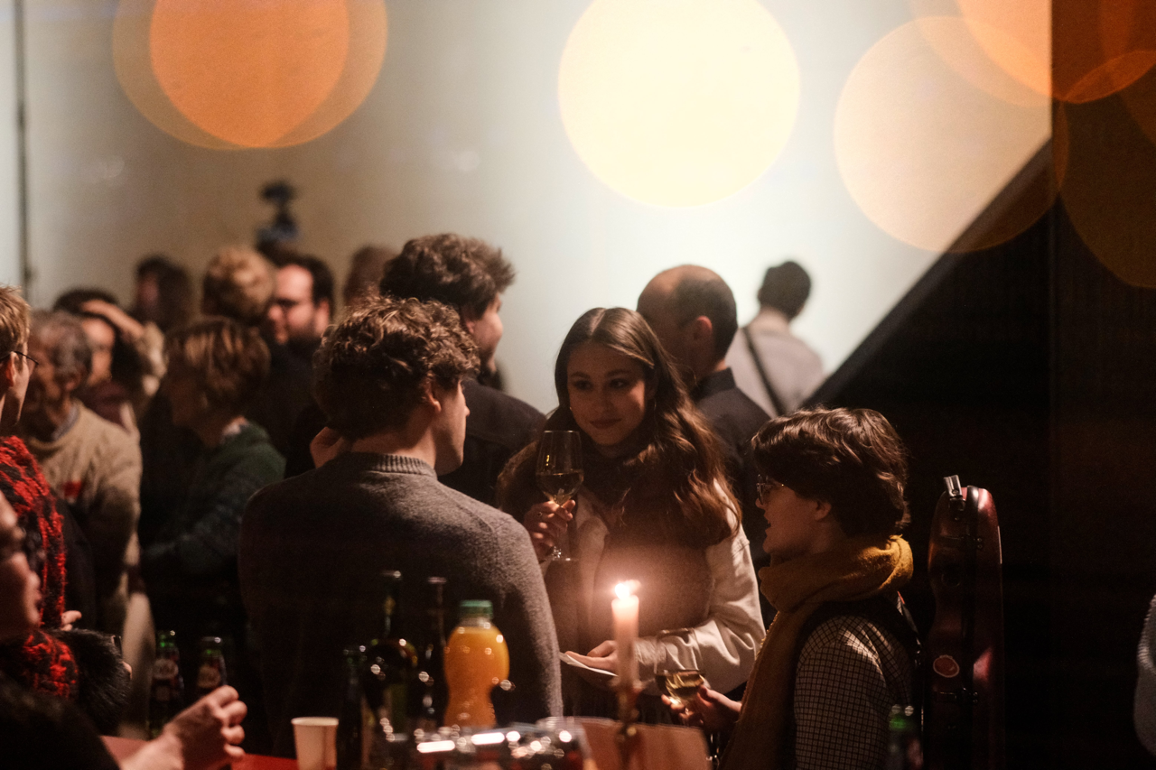 Young people socialising at the bar